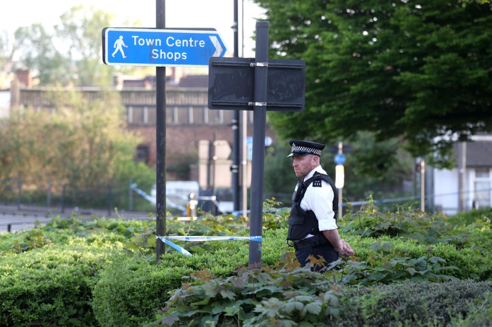  A police officer stands on patrol in Harrow, where two schoolboys were shot on Sunday afternoon