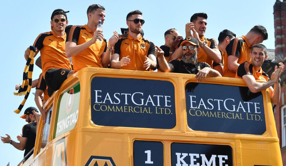  Wolves players lap up their open top bus promotion celebration