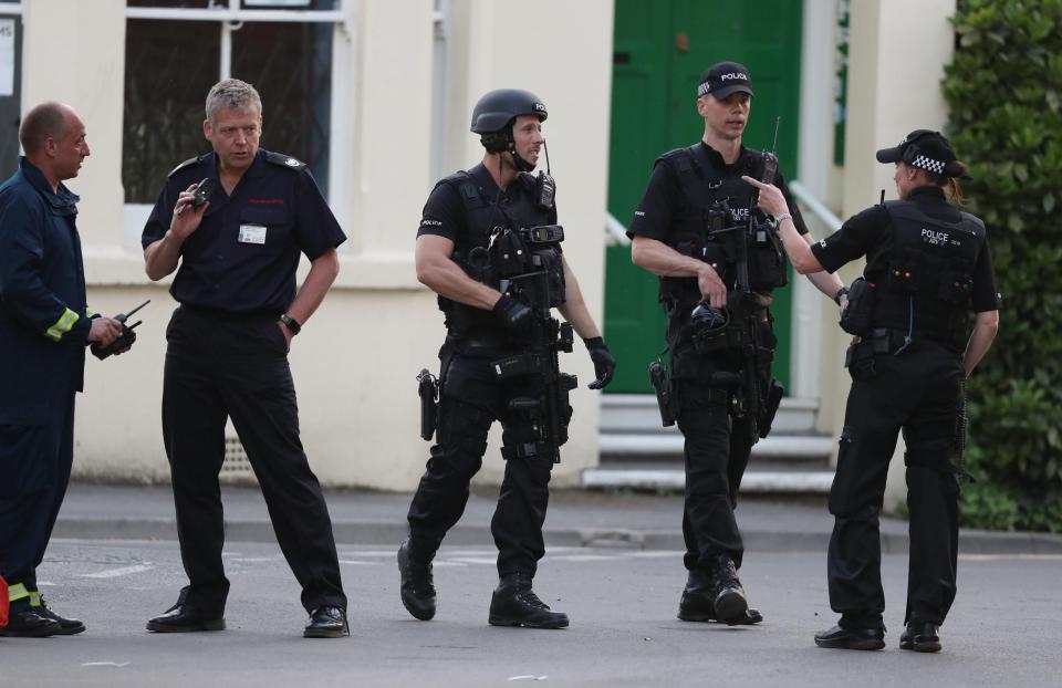  Armed officers patrol Oxford city centre after reports of a shootout between cops and an armed gunman