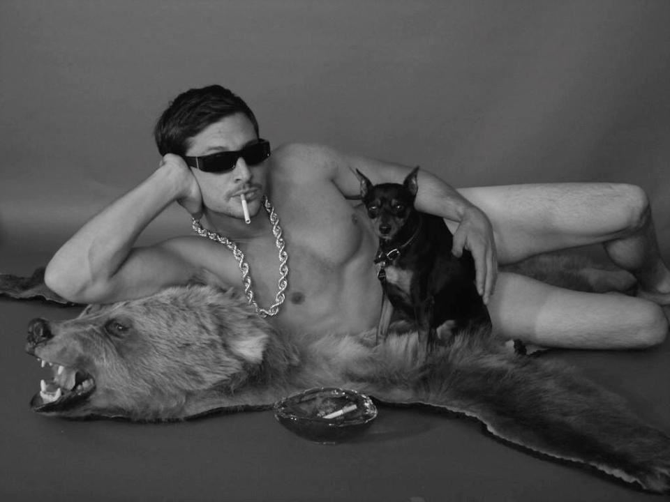  Scary Movie star Simon Rex - pictured with pet dog Duane - is now also a comedian and rapper using the name Dirt Nasty