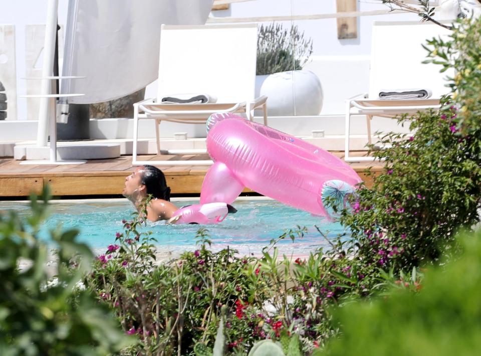  Georgia gasps for air after falling off her inflatable flamingo