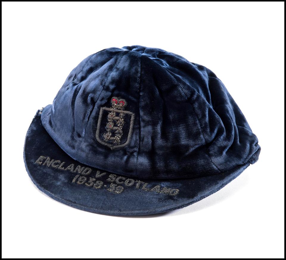  The items up for sale include Joe's England caps, of which he won five