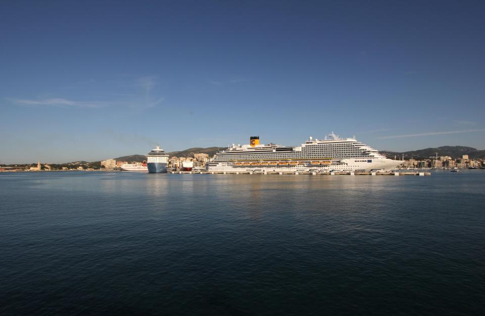  Cruise ships dock in Palma harbour - locals are campaigning to have a cap of two per day to limit the effect on the city