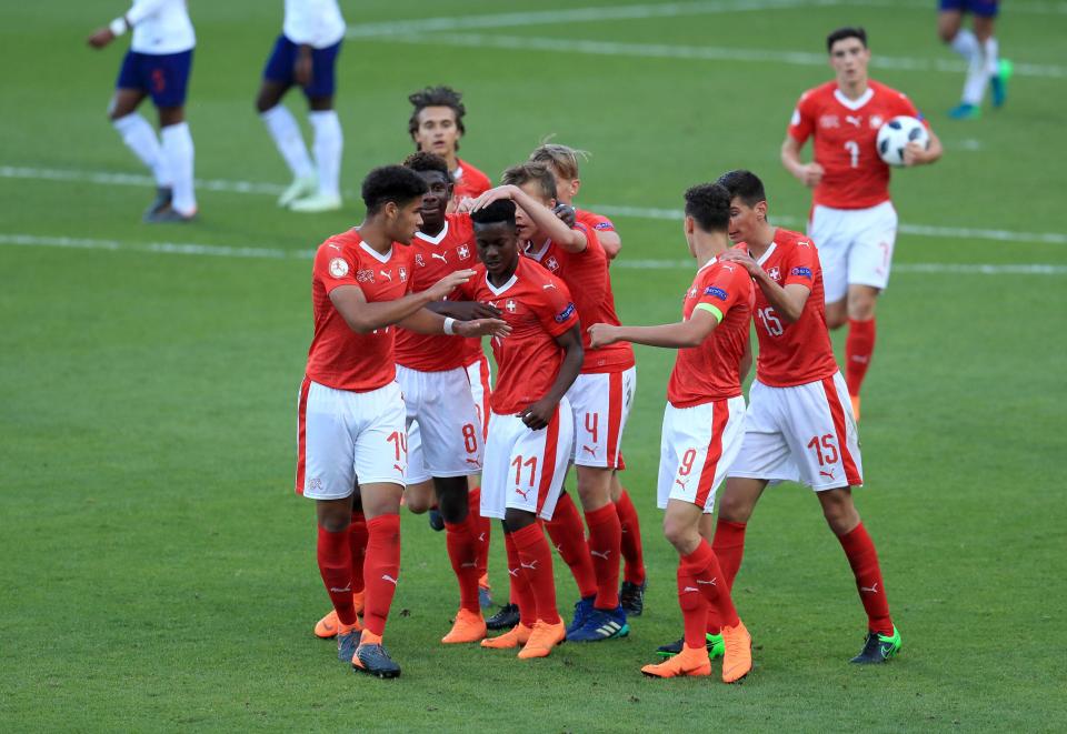  Switzerland celebratre Felix Mambini's goal