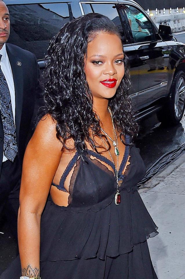  Rihanna went for a sexy red lip for her launch party