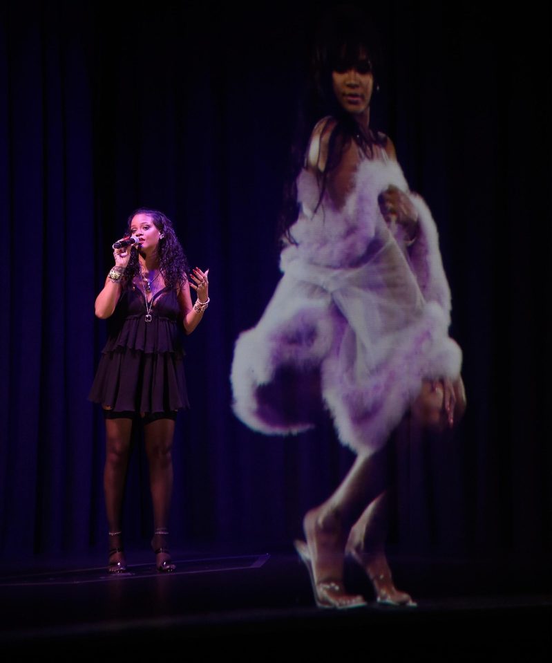  A hologram of Rihanna appeared on stage next to her