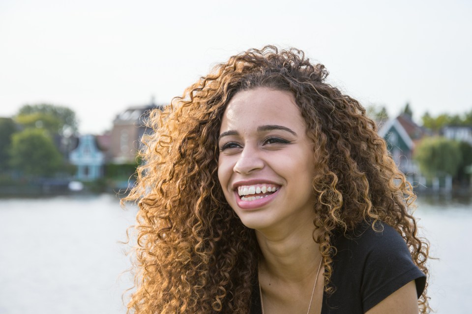 Women are less worried about grey hair than how to tame their frizzy tresses