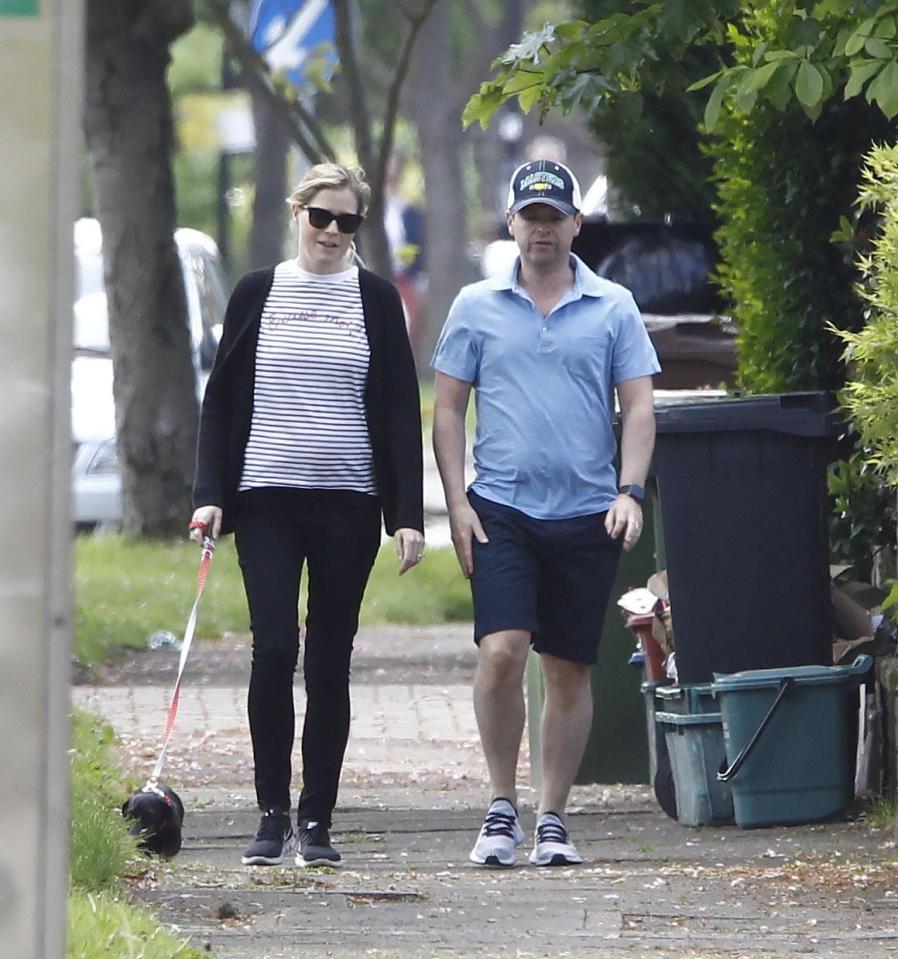 Ali, 40, showed off her bump in a striped T-shirt 