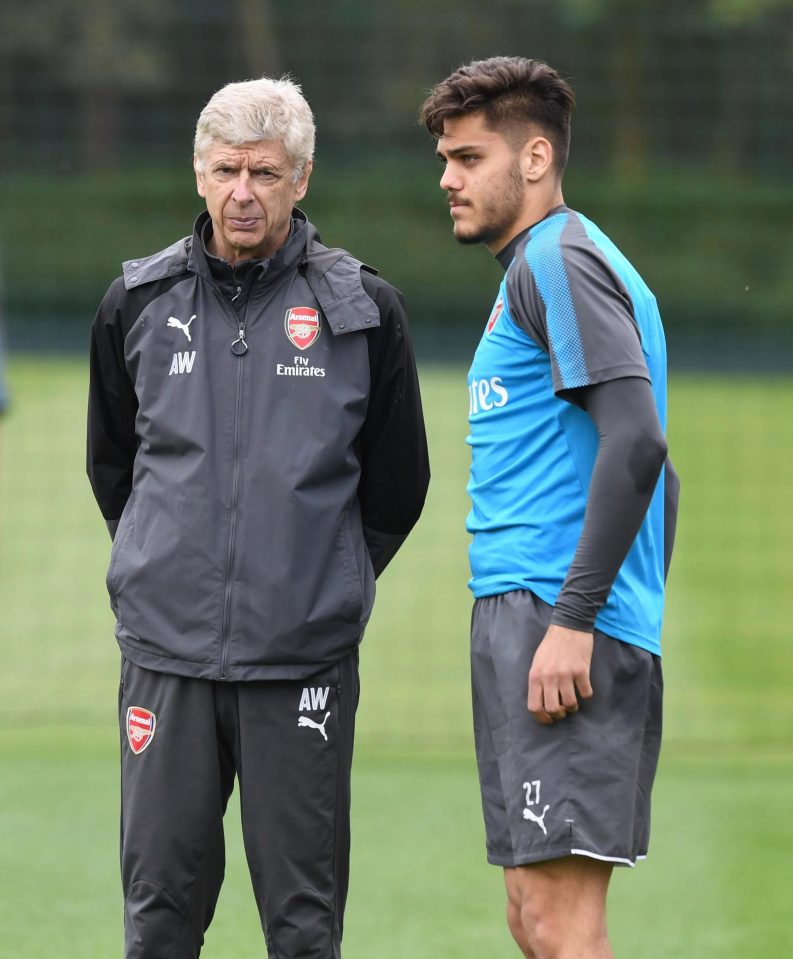  Konstantinos Mavropanos gets some final words of advice from Arsene Wenger