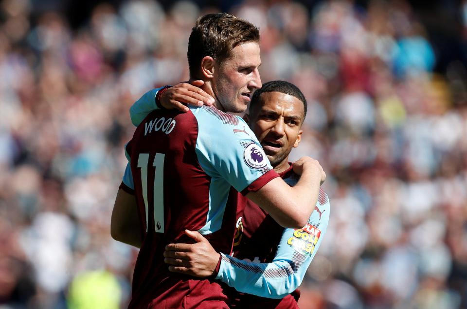  Wood, 26, celebrates with Aaron Lennon after his 39th minute strike