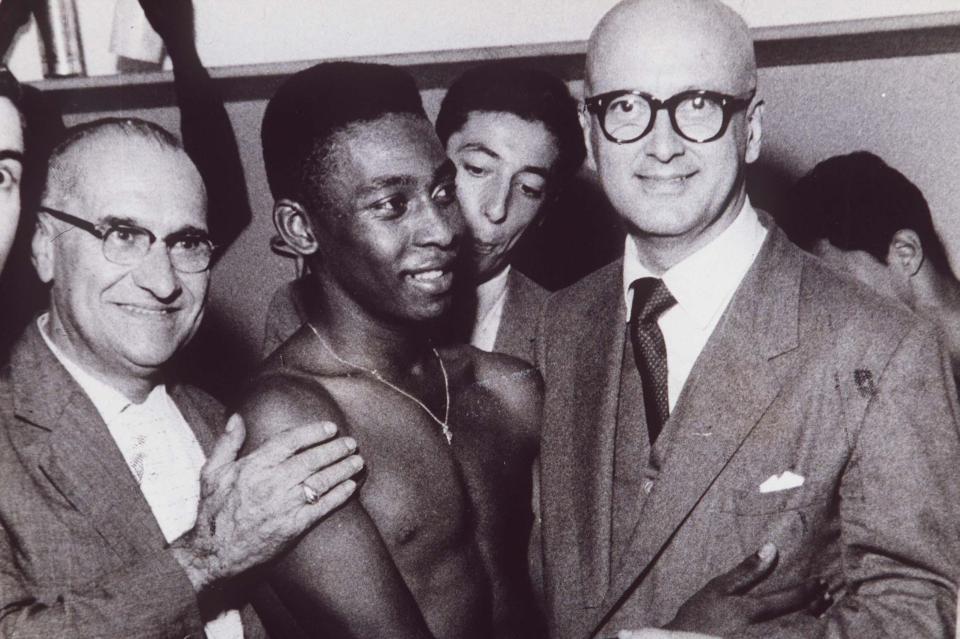  Pele is congratulated by Gunnar Lange, the then-president of Sweden's FA, in 1958