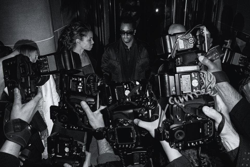  P Diddy hits a wall of cameras as he leaves Cipriani restaurant in Mayfair