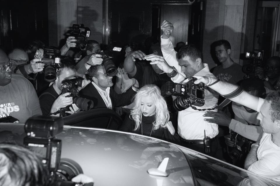  Christina Aguilera was crowded when she departed The Sanderson Hotel in central London