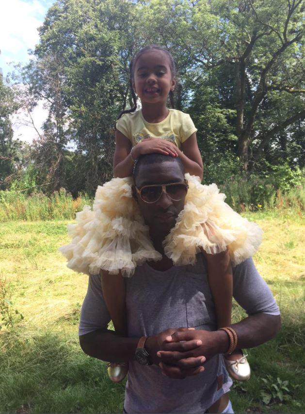  Jlloyd Samuel poses with daughter Amara