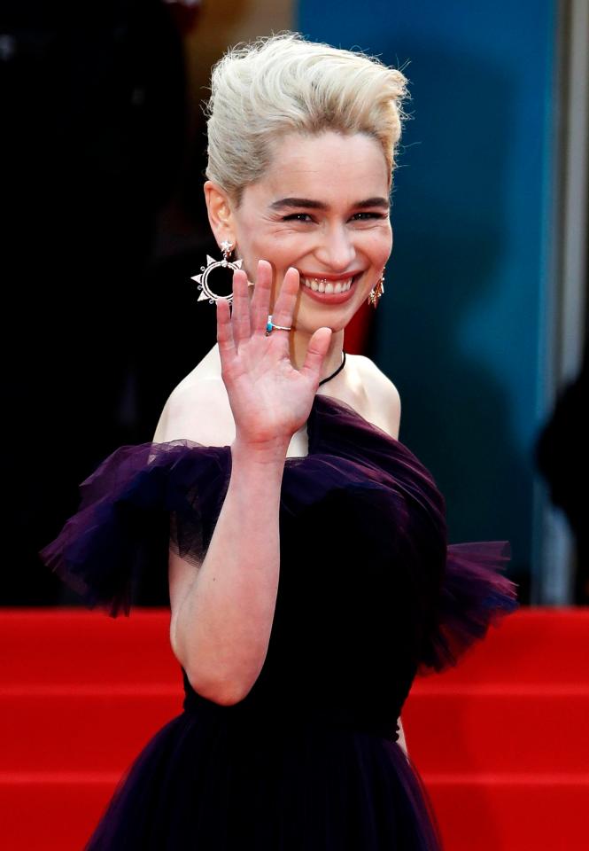  Emilia looked in high spirits as she posed for pictures