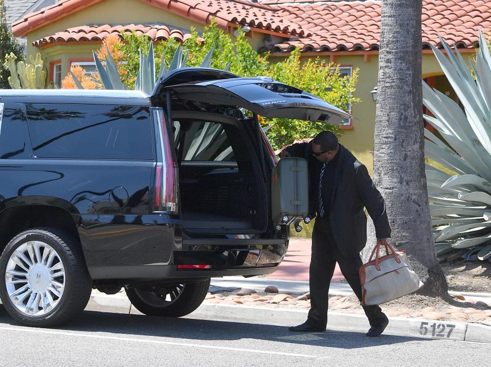  Her driver was seen loading the black SUV with her luggage on Tuesday