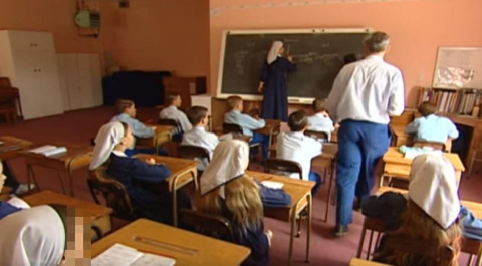  Children are pictured inside one of the community's schools