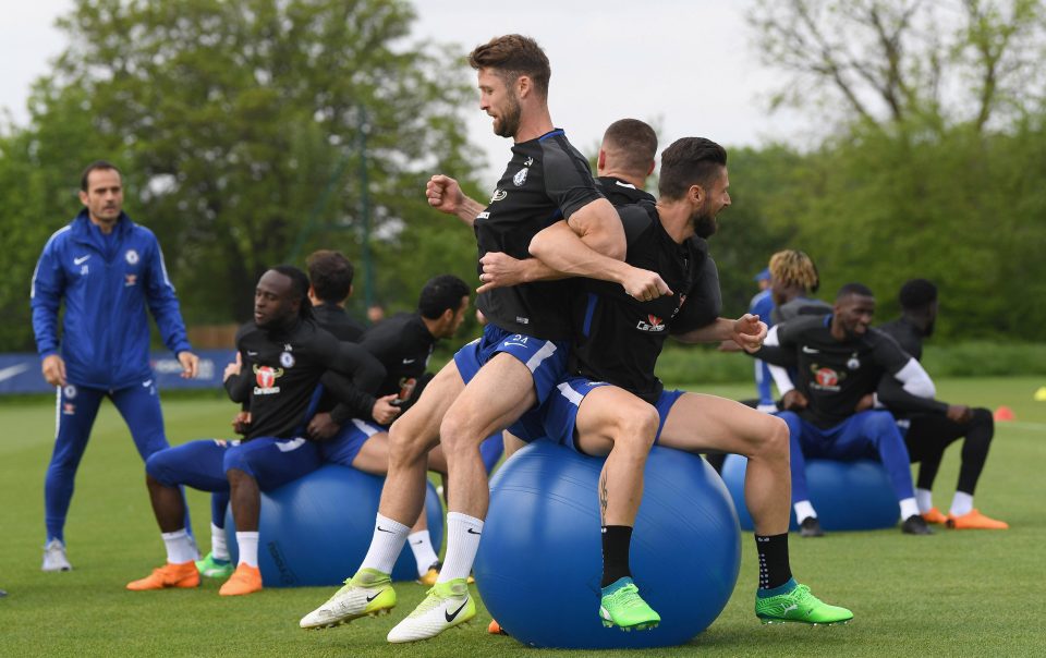  Chelsea players use an exercise ball to keep supple ahead of the FA Cup final