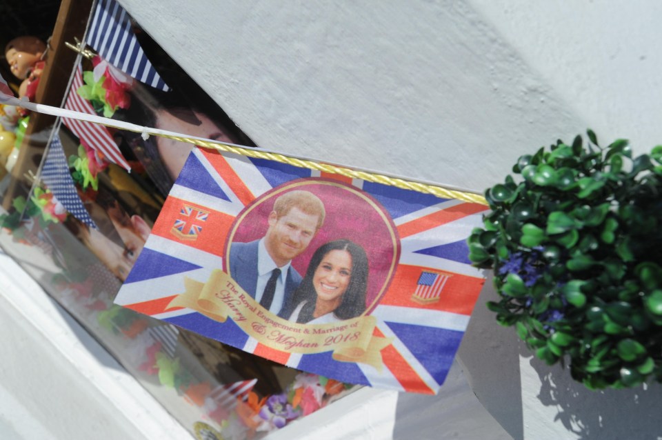 Posters and signs celebrating the wedding are decorating Windsor