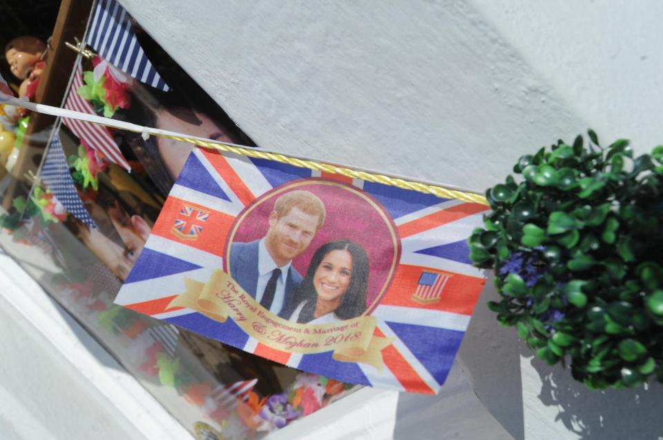  Posters and signs celebrating the wedding are decorating Windsor