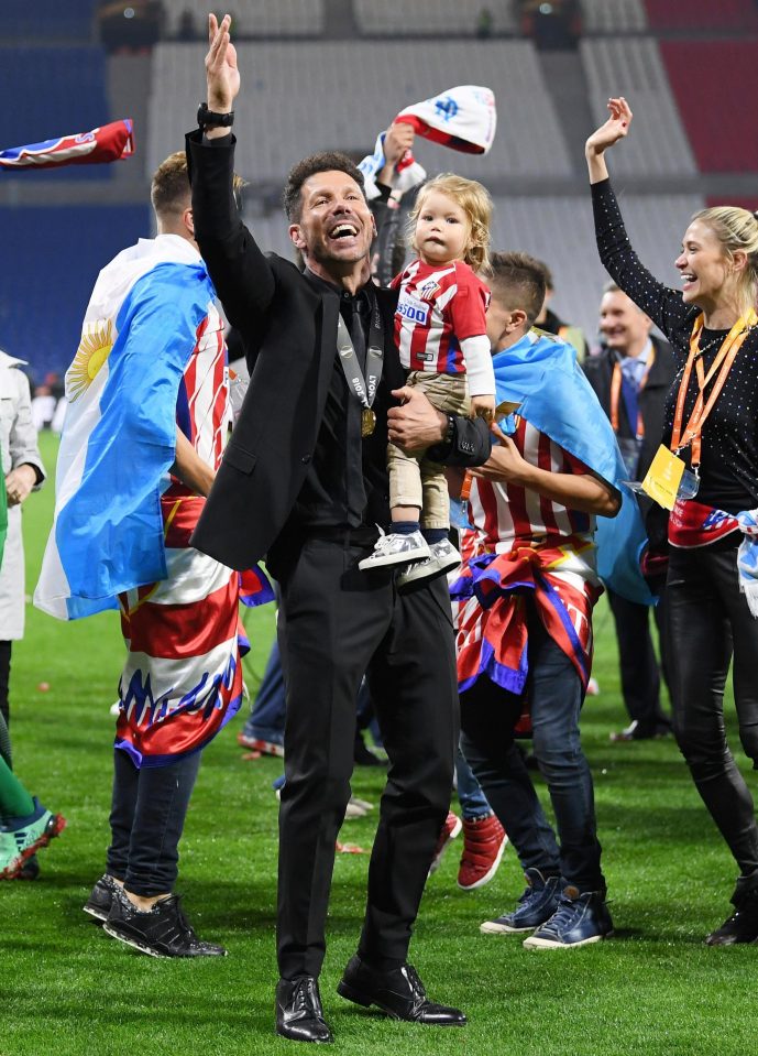  Atletico Madrid manager Diego Simeone celebrates with baby Francesca