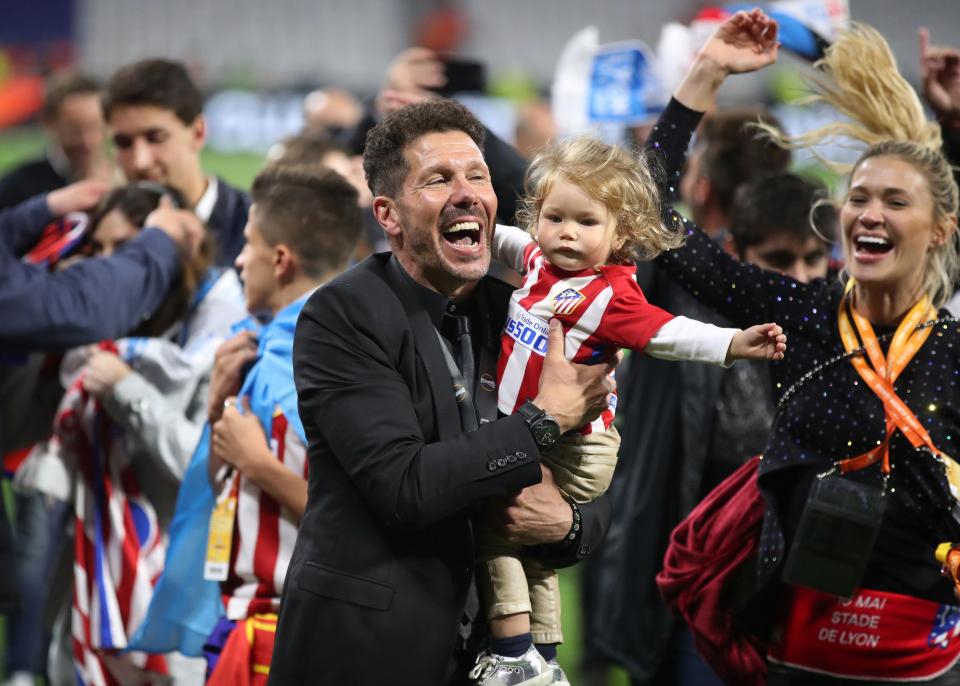  Diego Simeone looks over the moon with baby Francesca as he celebrates Atletico Madrid win