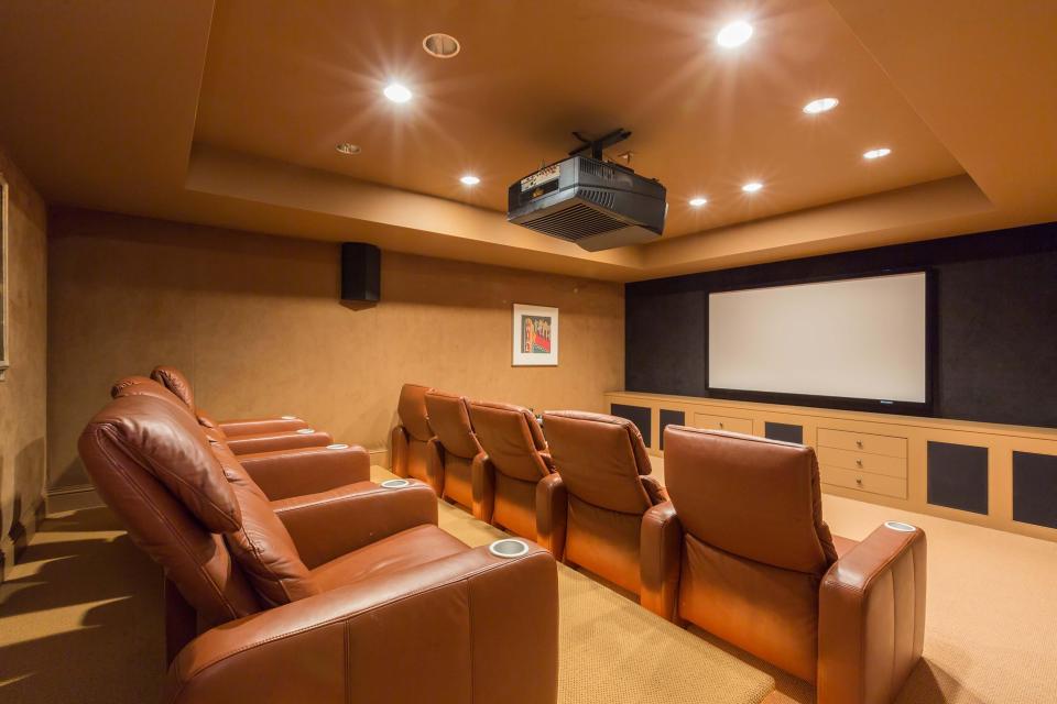  There is even a home cinema with more than enough room for Wayne, wife Coleen and their four kids