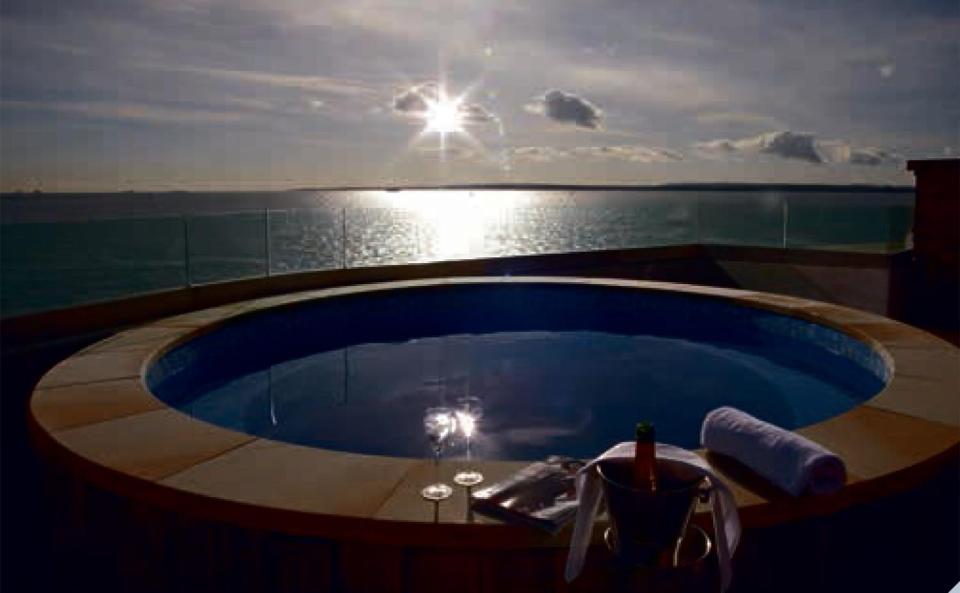  The roof terrace features an open-air hot pool