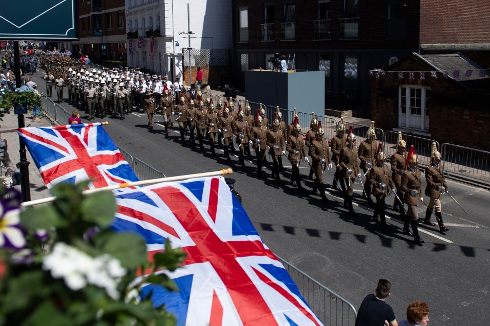 Military personal take part in a carriage rehearsal in Windsor