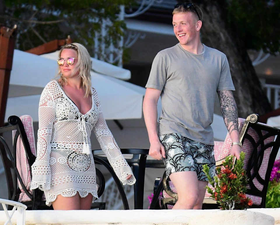  England's Jordan Pickford and Megan Davison look out at the Atlantic Ocean