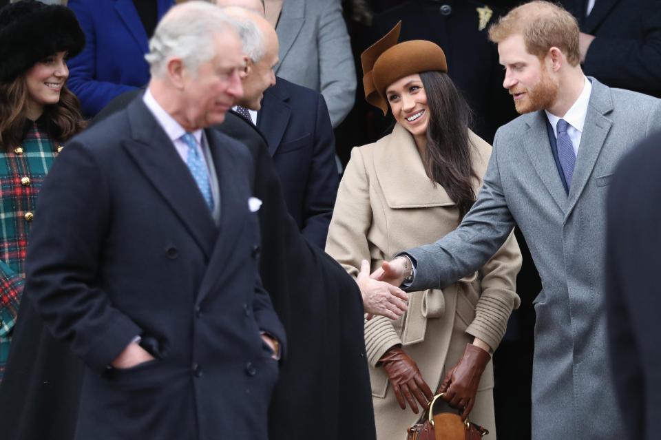  Meghan, seen here with Prince Charles at Christmas , is said to have developed a close bond with Harry's father