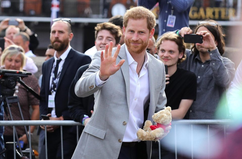  Harry waved to the crowds as he made his way through Windor