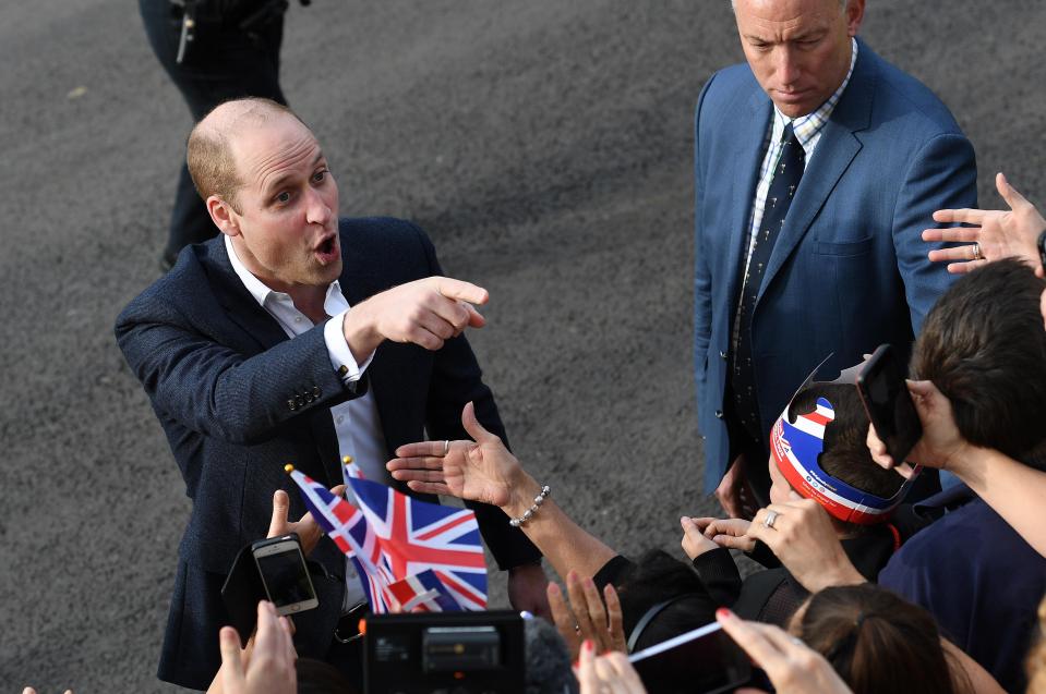  Wills joked with one fan as he greeted crowds with Harry