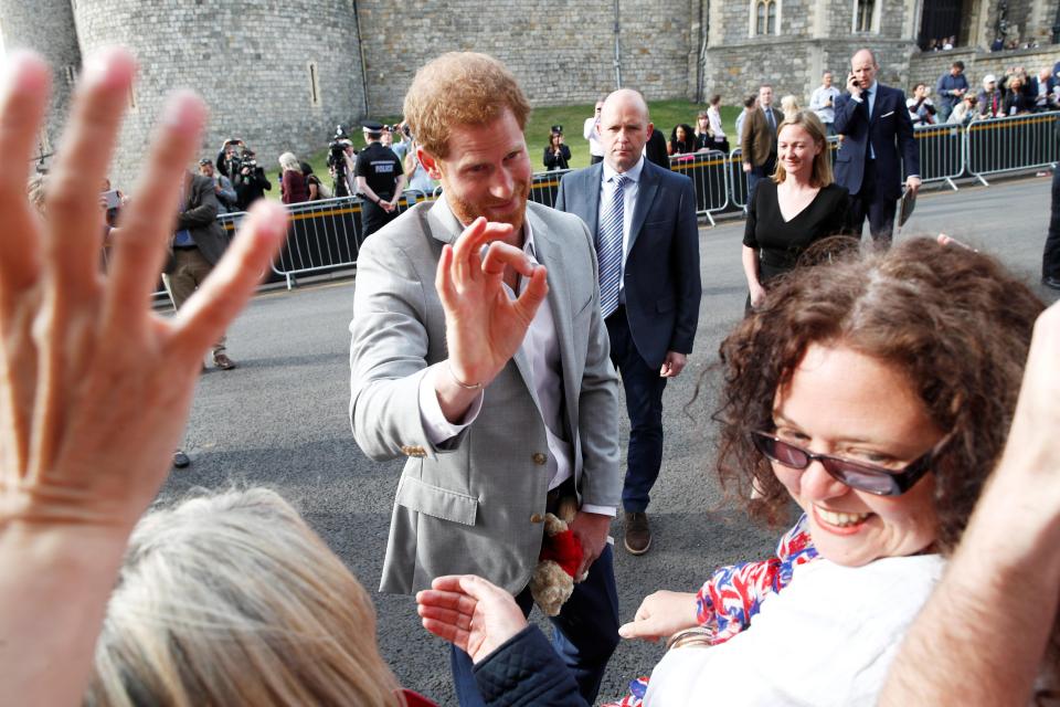  Prince Harry jokes with the crowd and well-wishers in Windsor