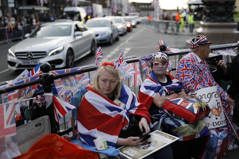  Well-wishers get in the spirit for the Royal Wedding with flags and colourful suits