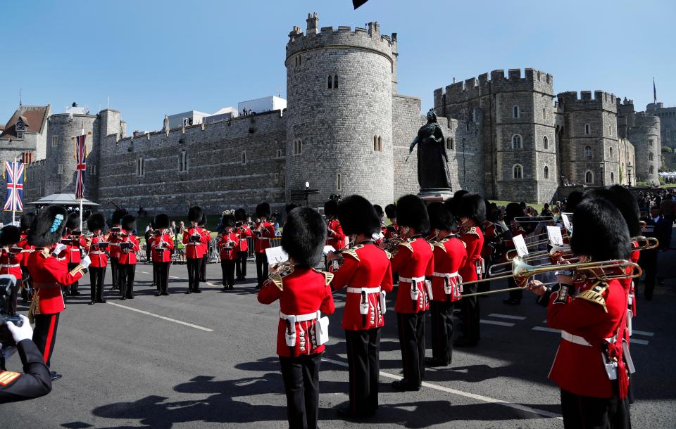  Guards outside Windsor Castle, where temperatures will hit the low twenties this afternoon