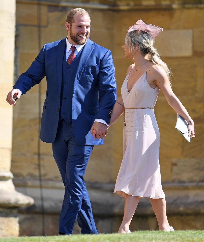  Chloe, wearing a pink dress with a pleated skirt, held hands with James as they walked into the church for the Royal Wedding