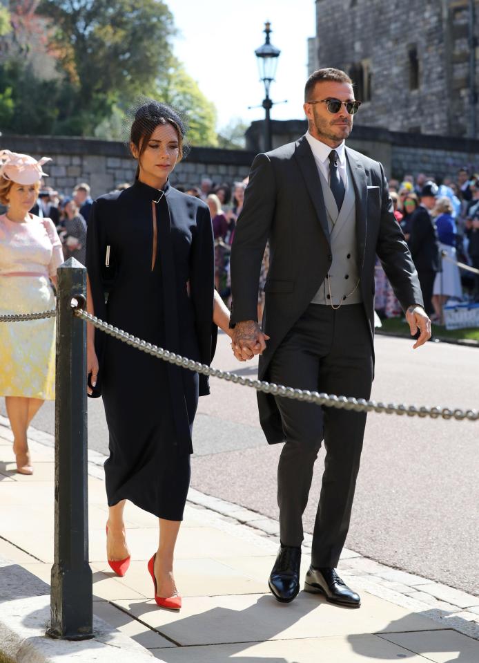  Victoria Beckham got told to cheer up by fans when she arrived with husband David in Windsor for the Royal Wedding