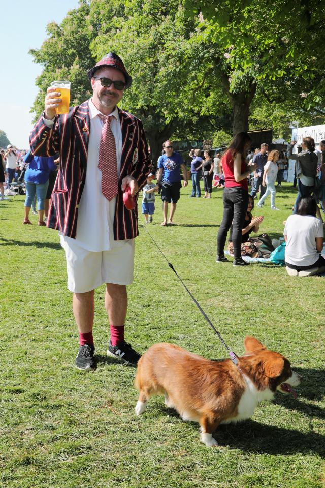  A Royal Wedding watcher with his pup in Windsor enjoying the sunshine today