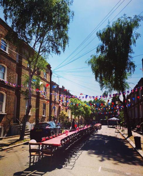 This street has gone all out with the bunting and enough room for everyone