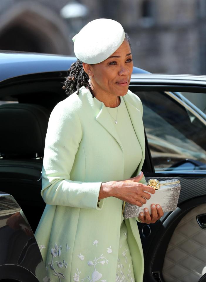  Meghan's yoga instructor mother Dora Ragland is sat on the front row of her side of the chapel