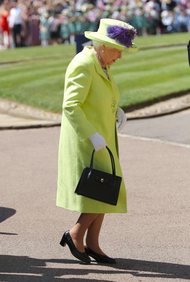  The Queen, naturally, is sat adjacent to the altar of Harry's side of the chapel