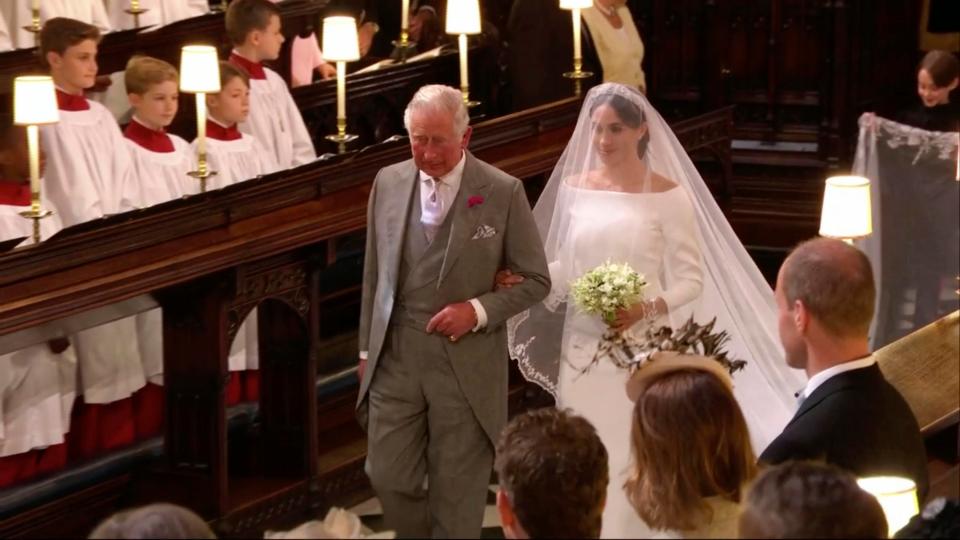  Prince Charles walked his new daughter-in-law Meghan Markle down the aisle at her wedding to Prince Harry