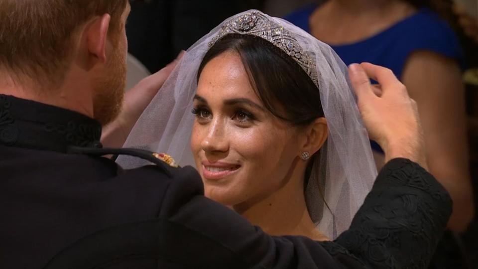  Harry lifted Meghan's veil up and stared lovingly into the eyes of his bride. Credit: ITV