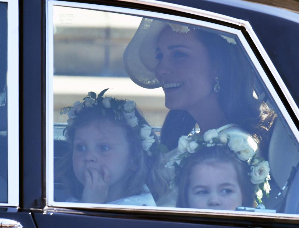  Kate Middleton travelled to the ceremony with her daughter Charlotte, right, who was a bridesmaid for Meghan