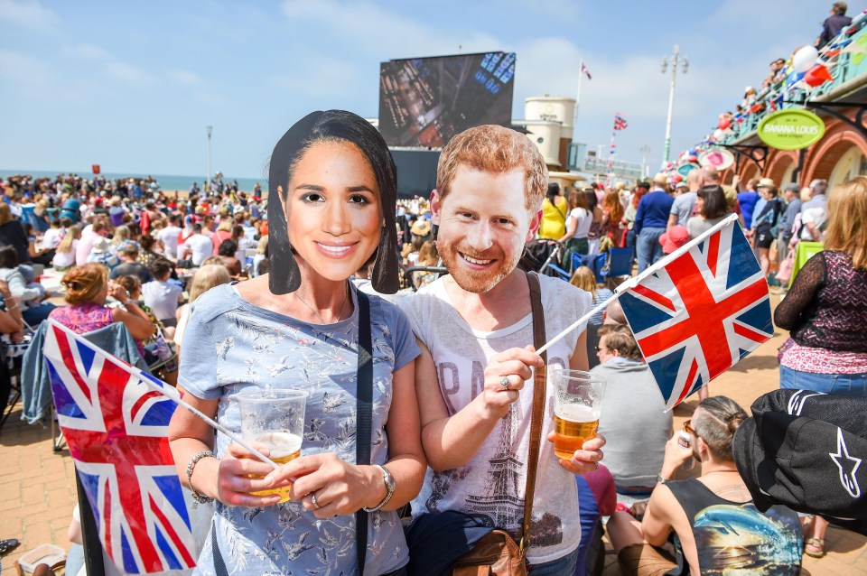 Brighton beachgoers came decked out with Meghan and Harry masks