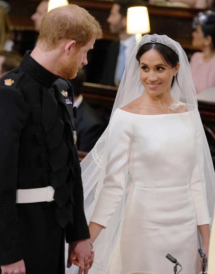  Meghan and Harry share a loving look