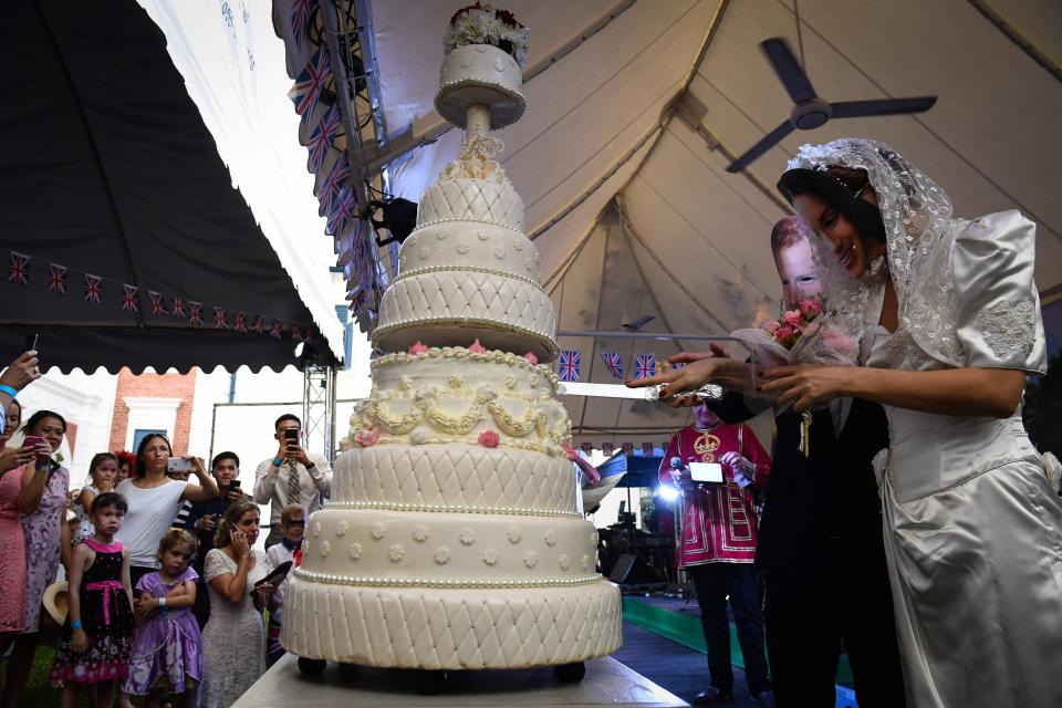  A Royal Wedding cake is rolled out at a party in Bangkok