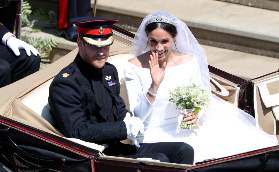  Prince Harry and Meghan Markle leave St George's Chapel in Windsor Castle after their wedding