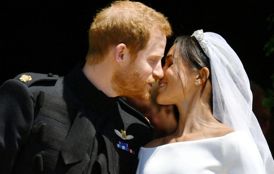  The royal couple looked smitten as they shared a kiss in front of delighted fans